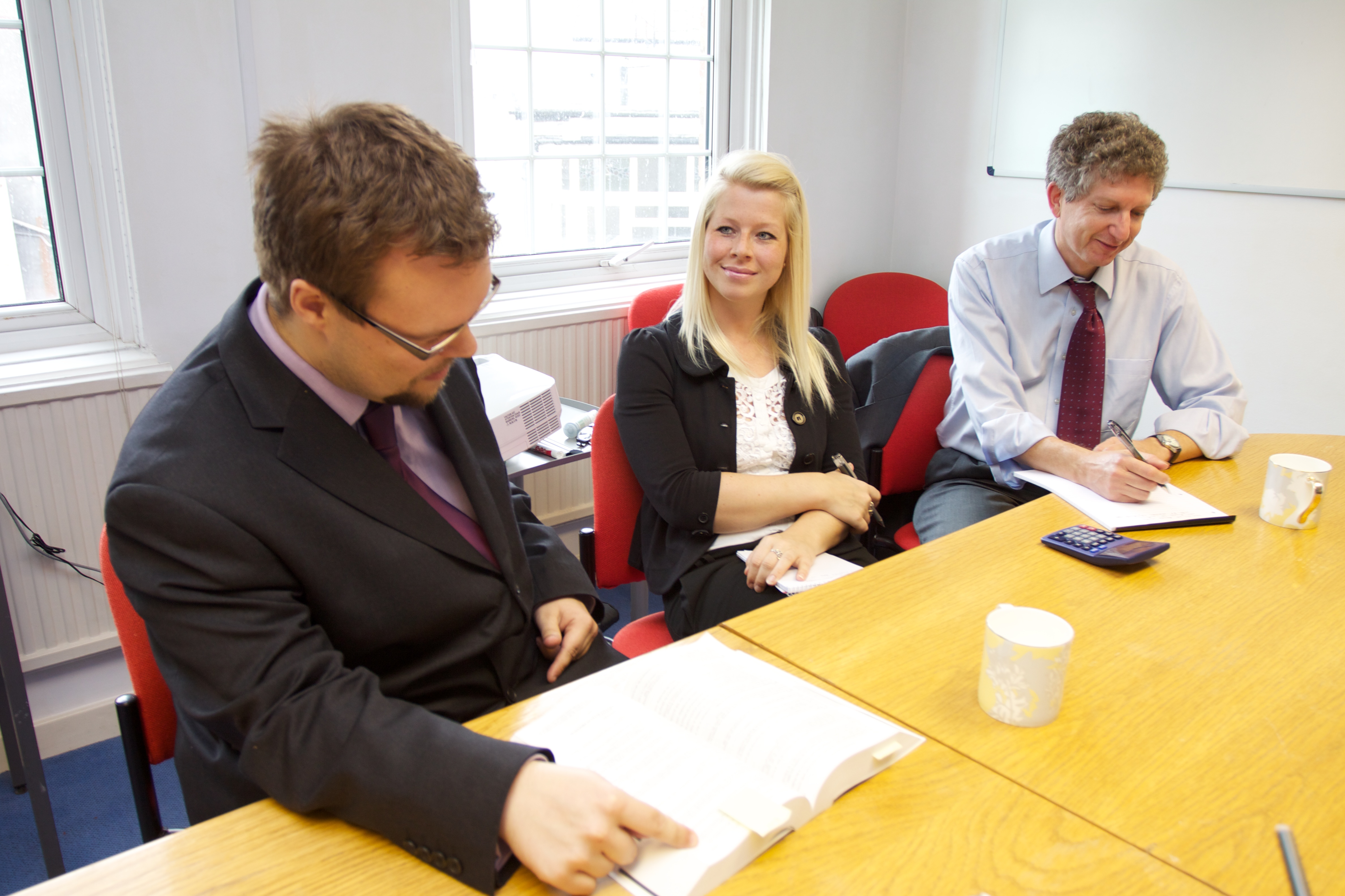 Employment lawyers discussing an equal pay claim