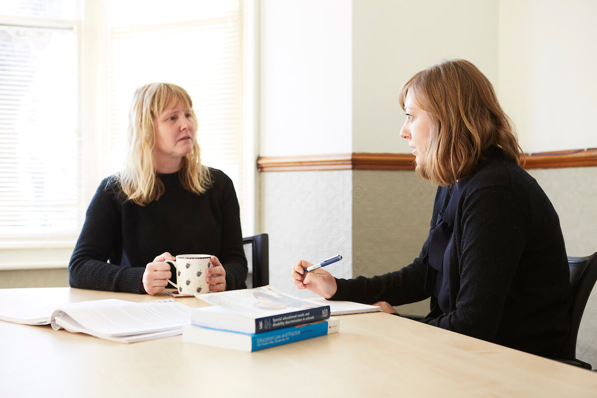 SEN Solicitor speaks with a client about appealing an NHS Children's Continuing Care Decision
